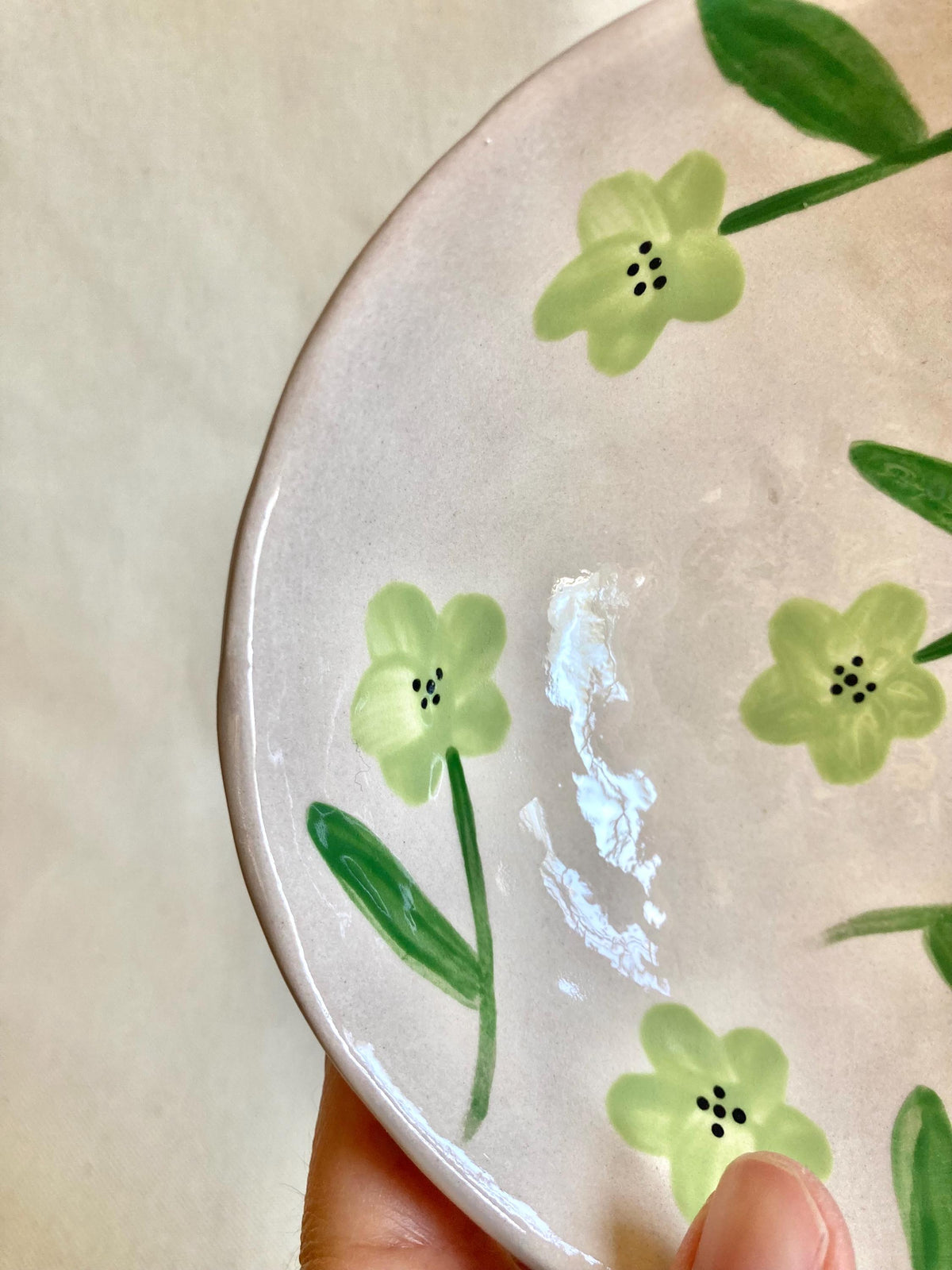 Bol céramique à fleurs vertes