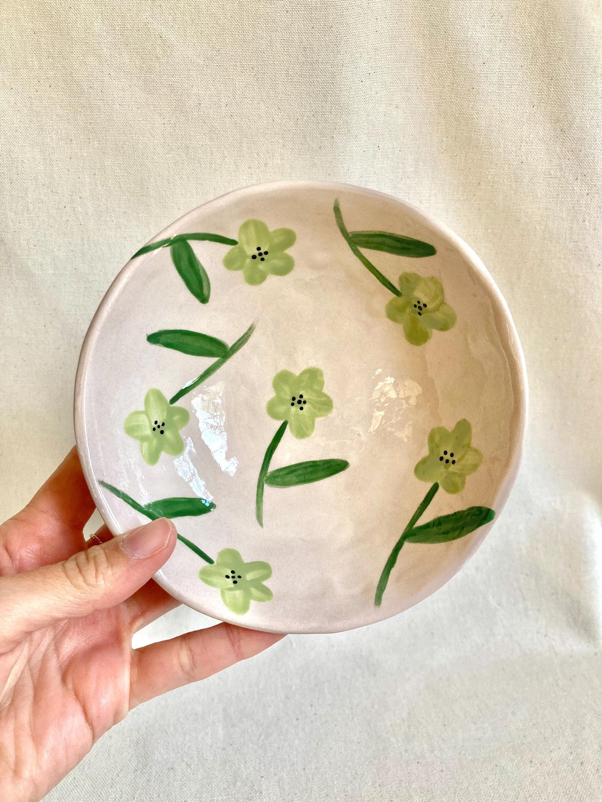 Bol céramique à fleurs vertes